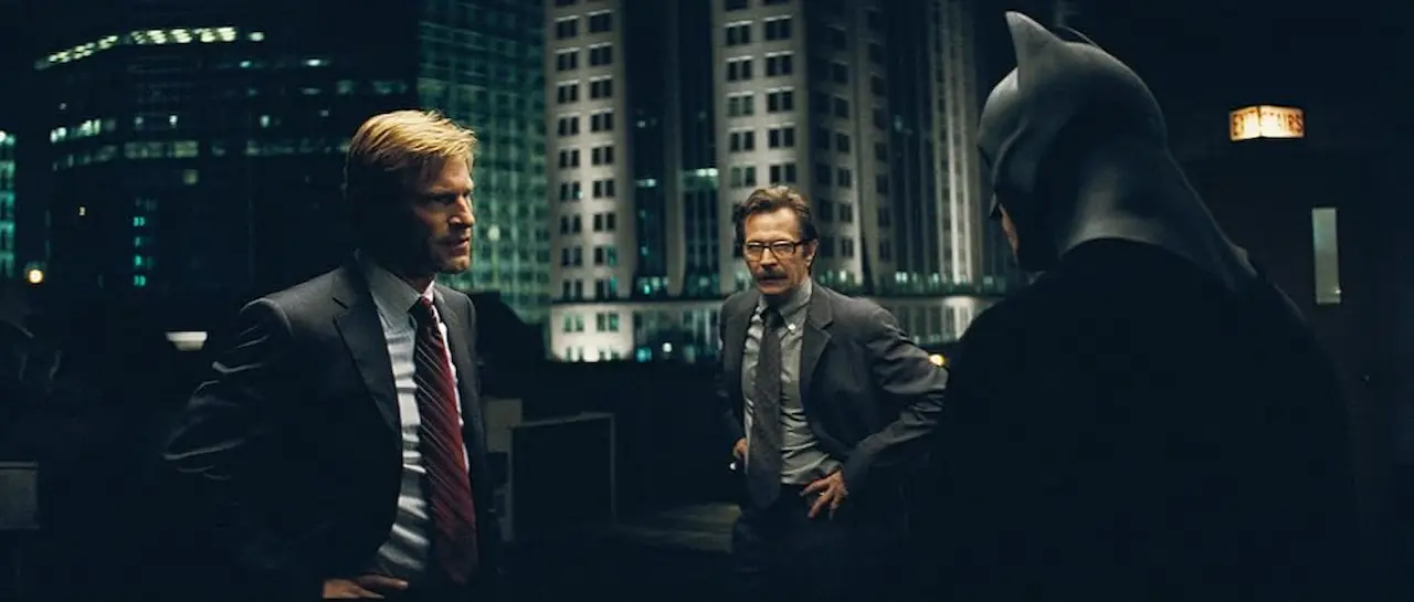 Gary Oldman, Christian Bale e Aaron Eckhart in Il cavaliere oscuro