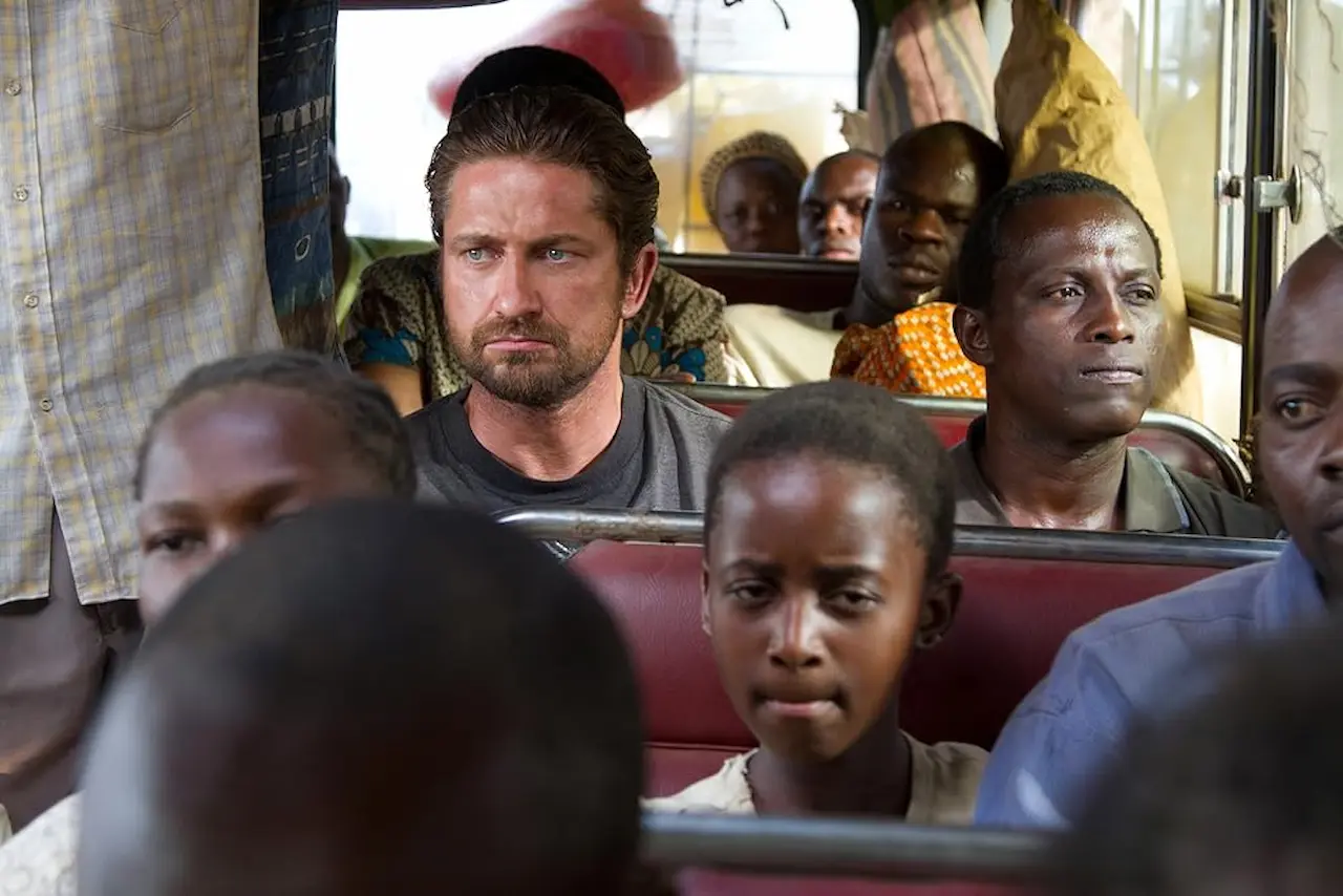 Gerard Butler e Souleymane Sy Savane in Machine Gun Preacher