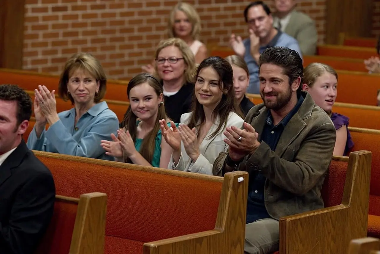 Kathy Baker, Gerard Butler, Michelle Monaghan e Madeline Carroll in Machine Gun Preacher