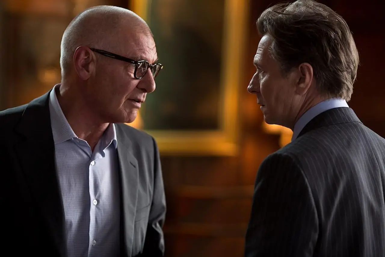 Harrison Ford e Gary Oldman in Il potere dei soldi