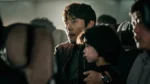Lee Byung-hun e Kim Bo-min in Emergency Declaration