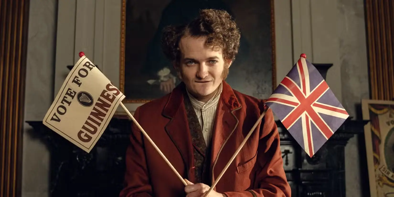 jack-gleeson-as-byron-hedges-holding-flags-in-house-of-guinness