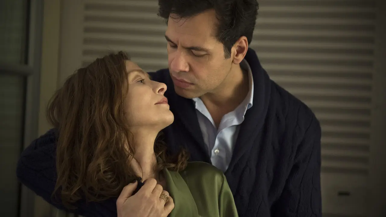 Isabelle Huppert e Laurent Lafitte in Elle