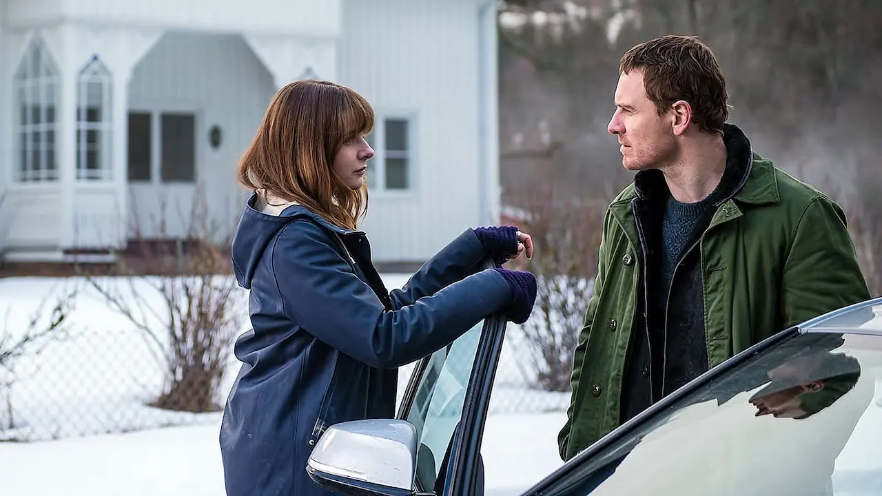 Rebecca Ferguson e Michael Fassbender in L'uomo di neve