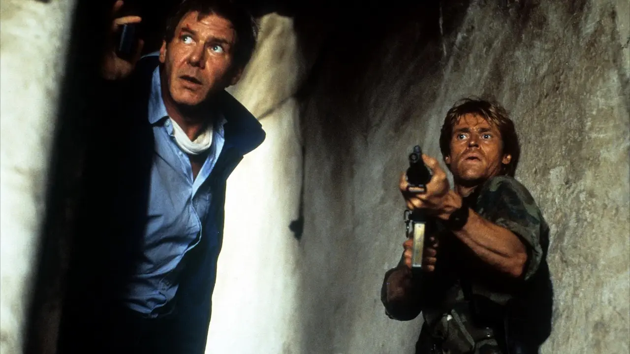 Harrison Ford e Willem Dafoe in Sotto il segno del pericolo