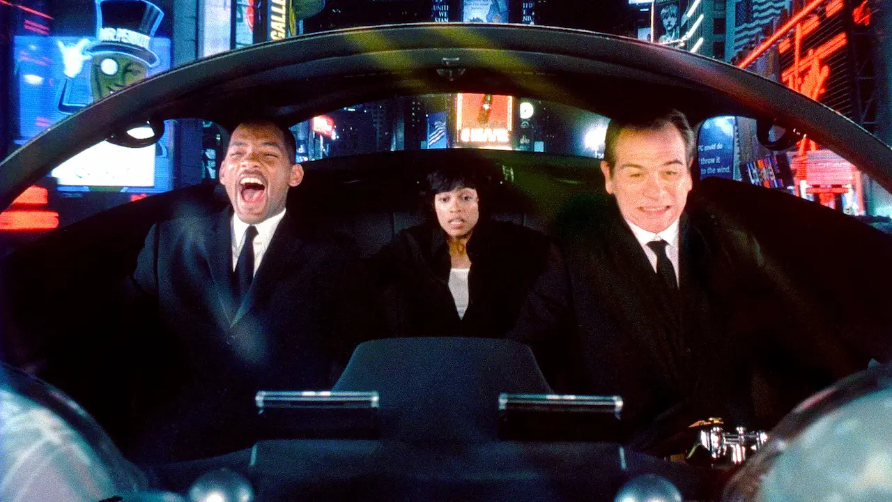Will Smith, Rosario Dawson e Tommy Lee Jones in Men in Black II