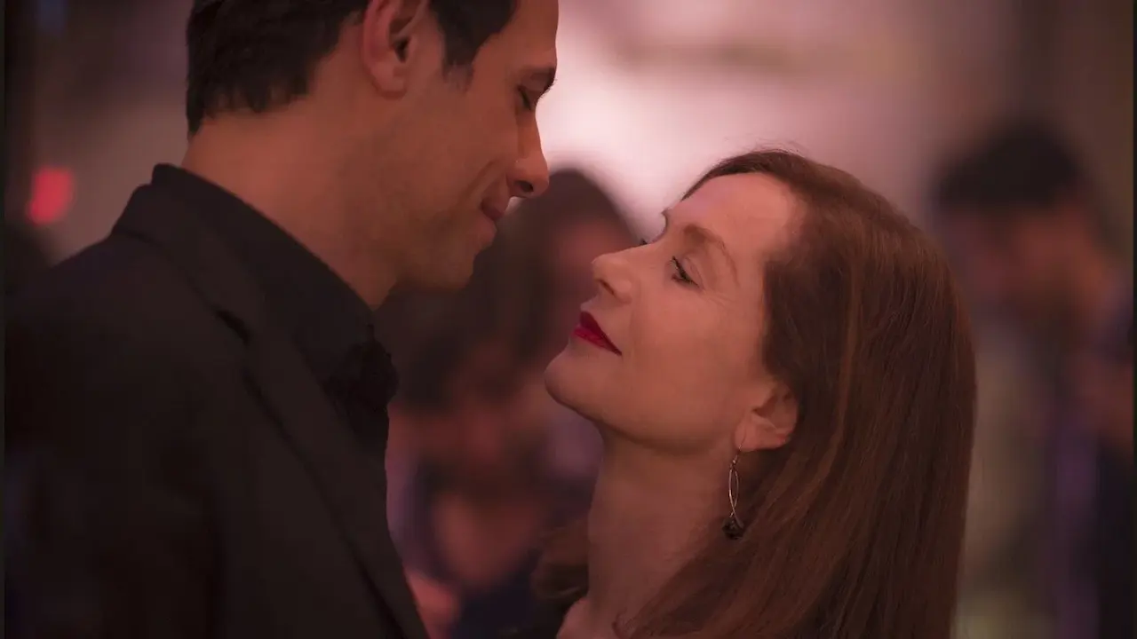 Isabelle Huppert e Laurent Lafitte in Elle